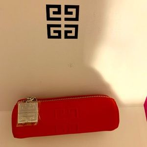 Red Givenchy lipstick holder